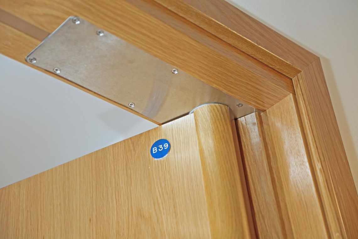 Concealed door closer